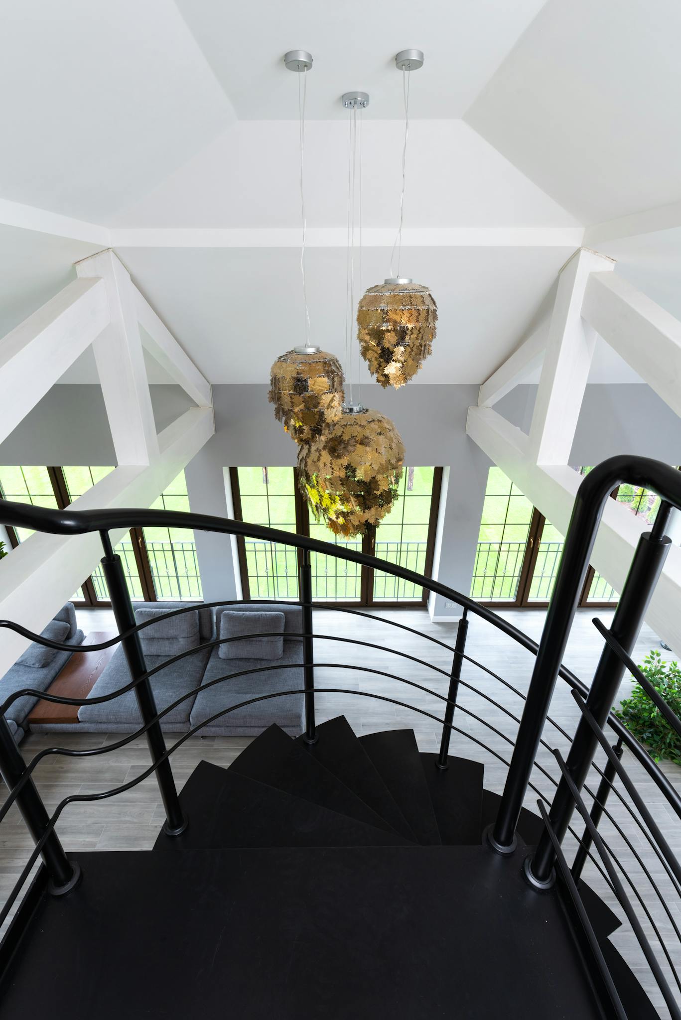 Golden shimmering lamps hanging on ceiling